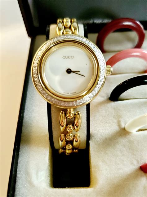 vintage gucci watch with bezels.